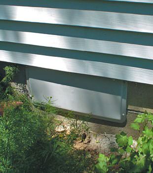 A gray crawl space vent cover in Morrisville