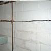Severe foundation damage from a long crack in a bucking wall of a Holly Springs home.