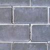 A diagonal stair-step crack found along a foundation wall in a Reidsville home