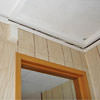 The ceiling and wall separating as the wall sinks with the slab floor in a Thomasville home