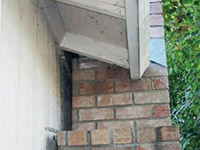 A chimney leaning away from the home on a Oak Ridge foundation