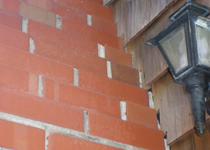 a repaired chimney in Morrisville that had shown serious foundation damage and was repaired with a helical pier system.