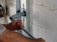 Mounting a foundation wall channel anchor in Chapel Hill.