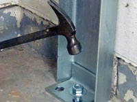 Mounting a foundation channel anchor installation to the floor in Chapel Hill.