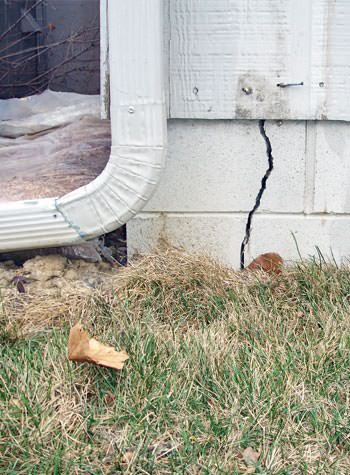 foundation wall cracks due to street creep in Advance