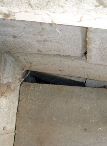 inward rotation of a foundation wall damaged by street creep in a garage in Graham