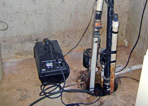 Pedestal sump pump system installed in a home in Boone