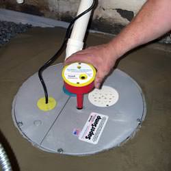 A newly installed sump pump system in a basement in Oak Ridge