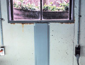 Repaired waterproofed basement window leak in Chapel Hill
